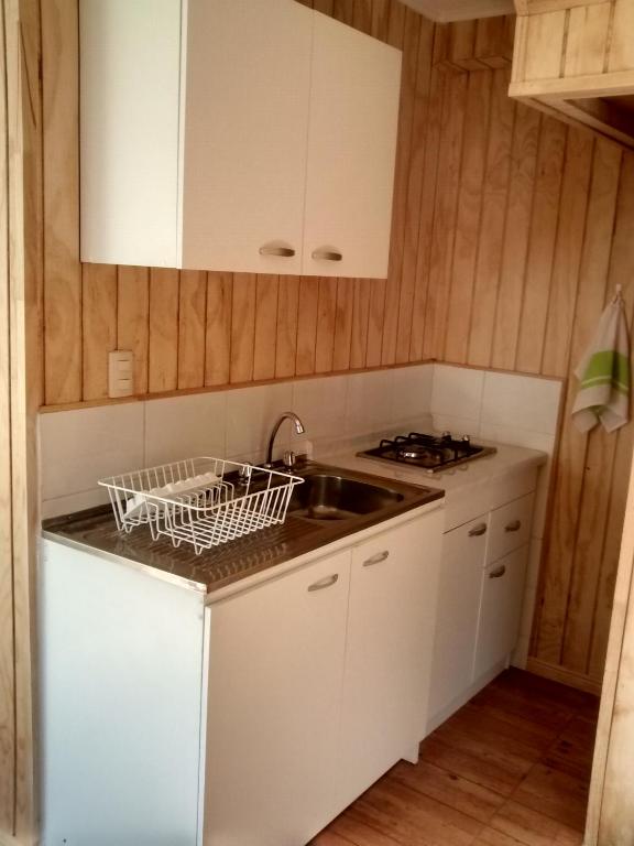 Kuchyň nebo kuchyňský kout v ubytování Cabañas Entre Parques