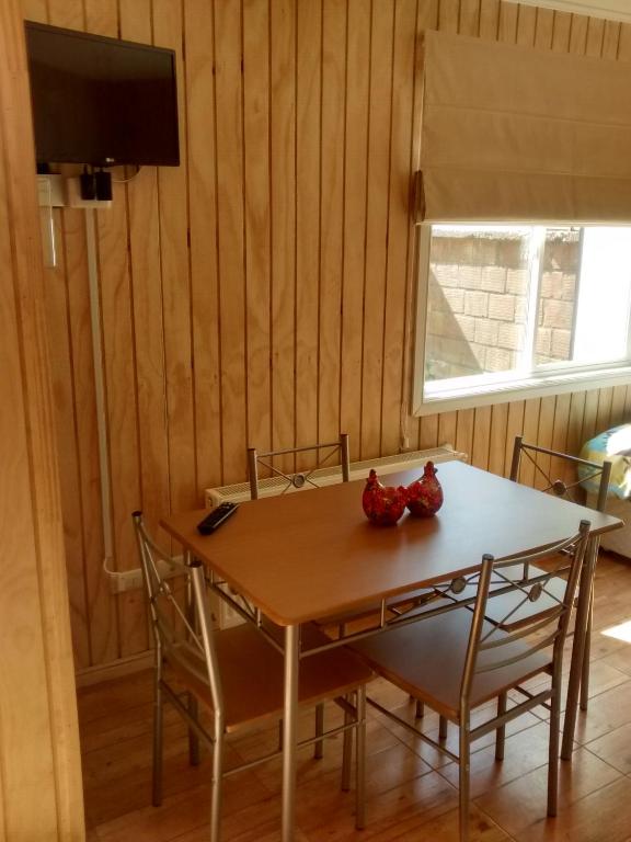 TV a/nebo společenská místnost v ubytování Cabañas Entre Parques