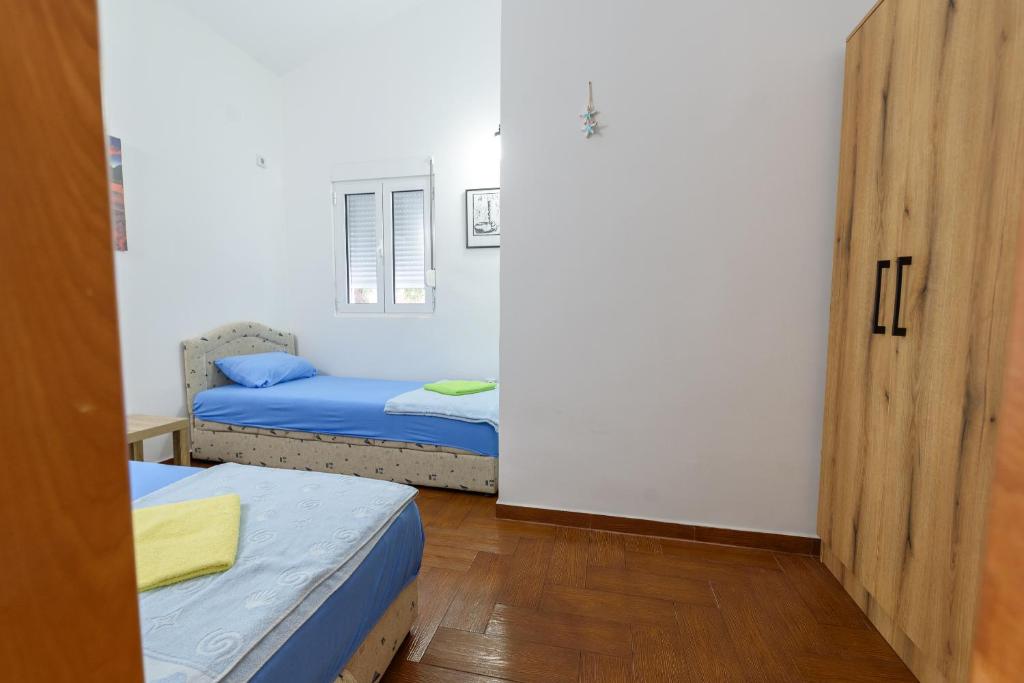 Postel nebo postele na pokoji v ubytování Vila Vujošević