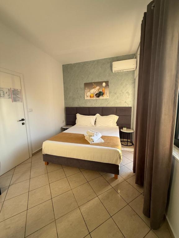 Postel nebo postele na pokoji v ubytování Hotel Summer