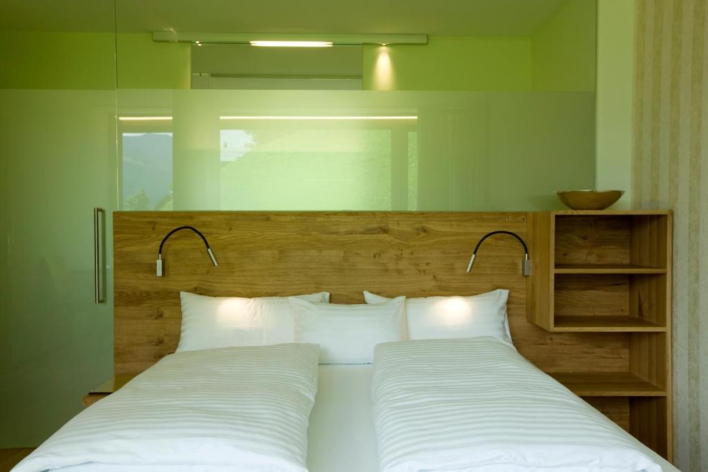Posteľ alebo postele v izbe v ubytovaní Hotel Alpenrose Ebnit