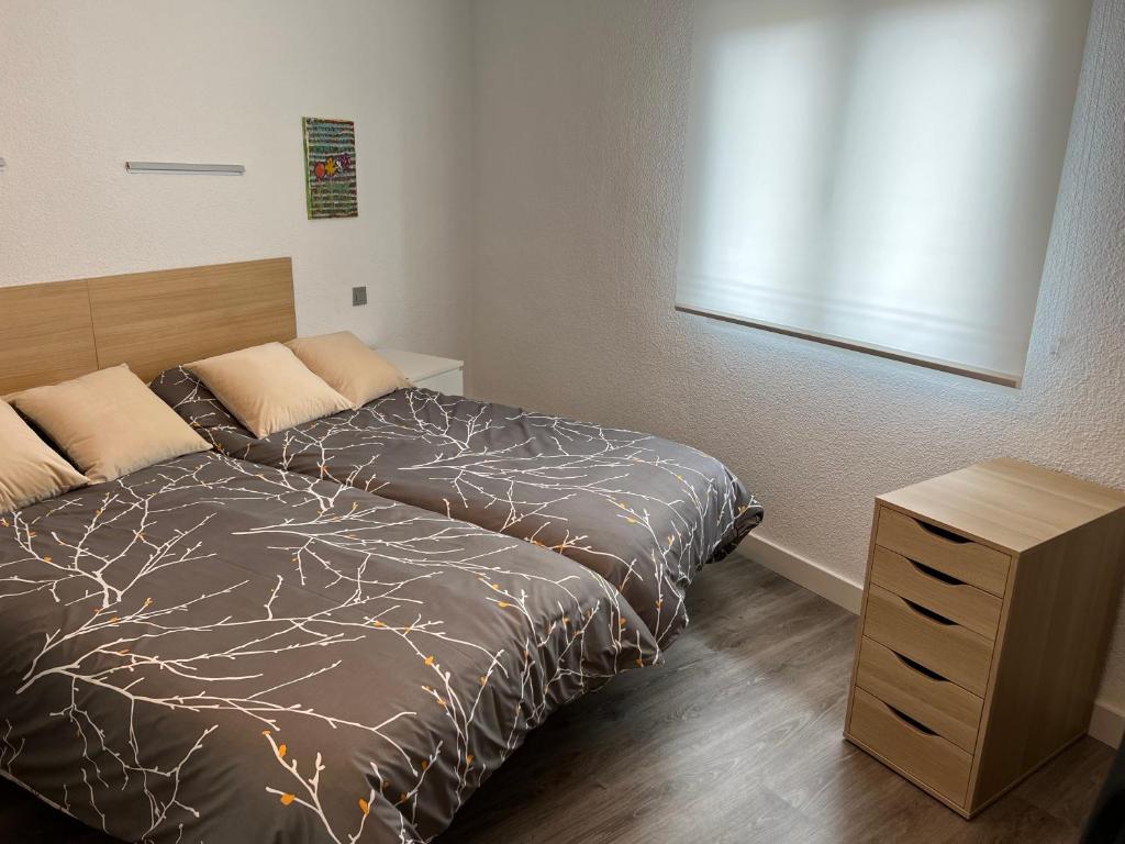 Postel nebo postele na pokoji v ubytování Casa Boutique en Pozuelo con 8 habitaciones y 4 baños compartidos