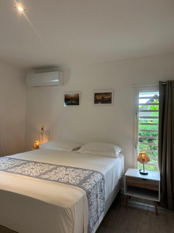 Postel nebo postele na pokoji v ubytování Moorea Sunset Beach