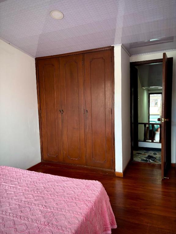 Postel nebo postele na pokoji v ubytování Kuyay Yachi Hostel