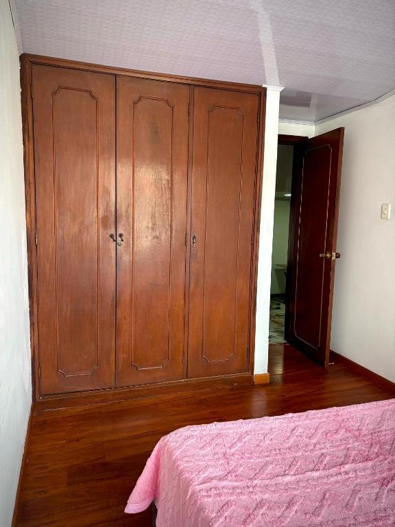Postel nebo postele na pokoji v ubytování Kuyay Yachi Hostel