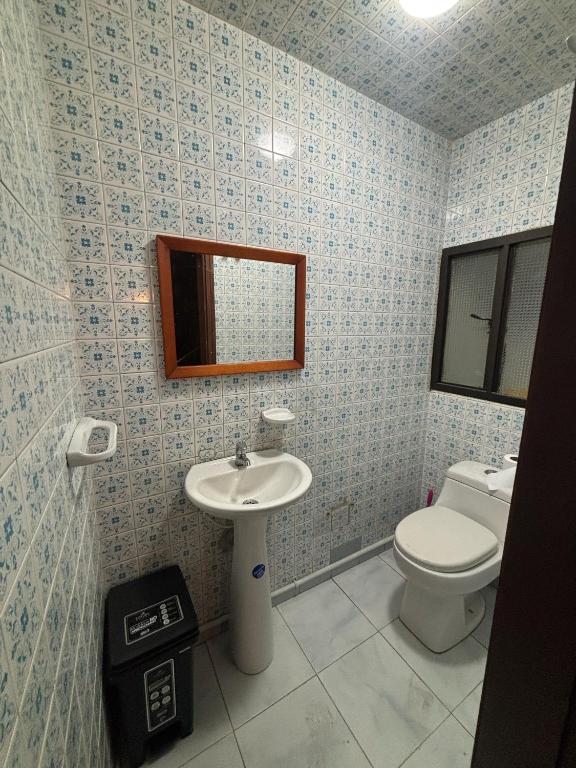 Koupelna v ubytování Kuyay Yachi Hostel