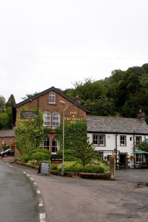 a building on the side of a road at Fox and Pheasant Inn in Armathwaite