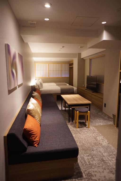 Postel nebo postele na pokoji v ubytování Premium Apart MONday GINZA EAST