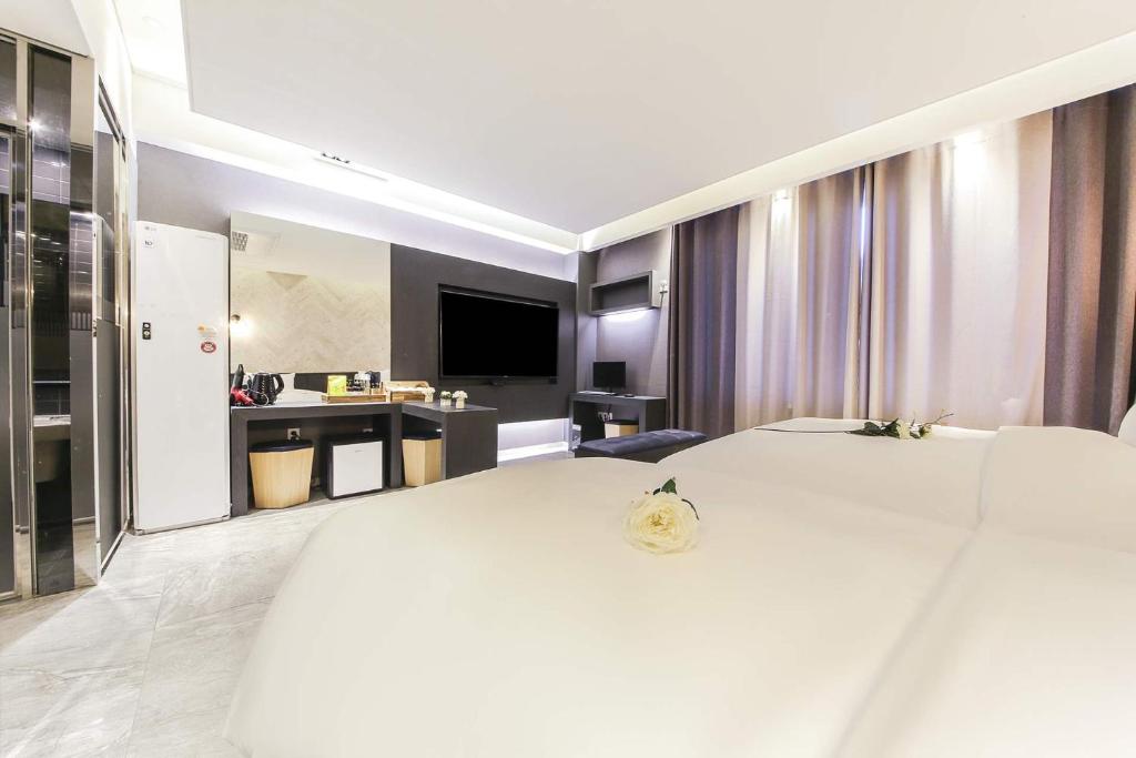 Postel nebo postele na pokoji v ubytování Hotel OSCAR