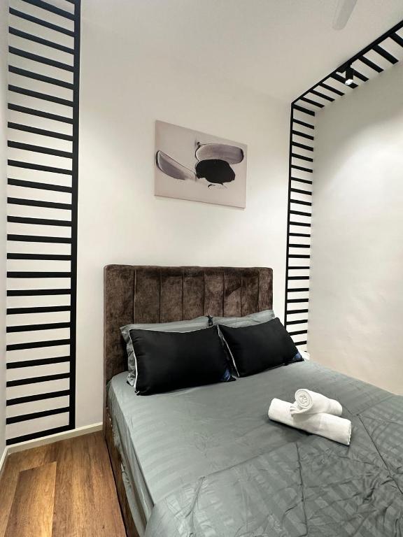 Postel nebo postele na pokoji v ubytování Sunway Onsen Suites
