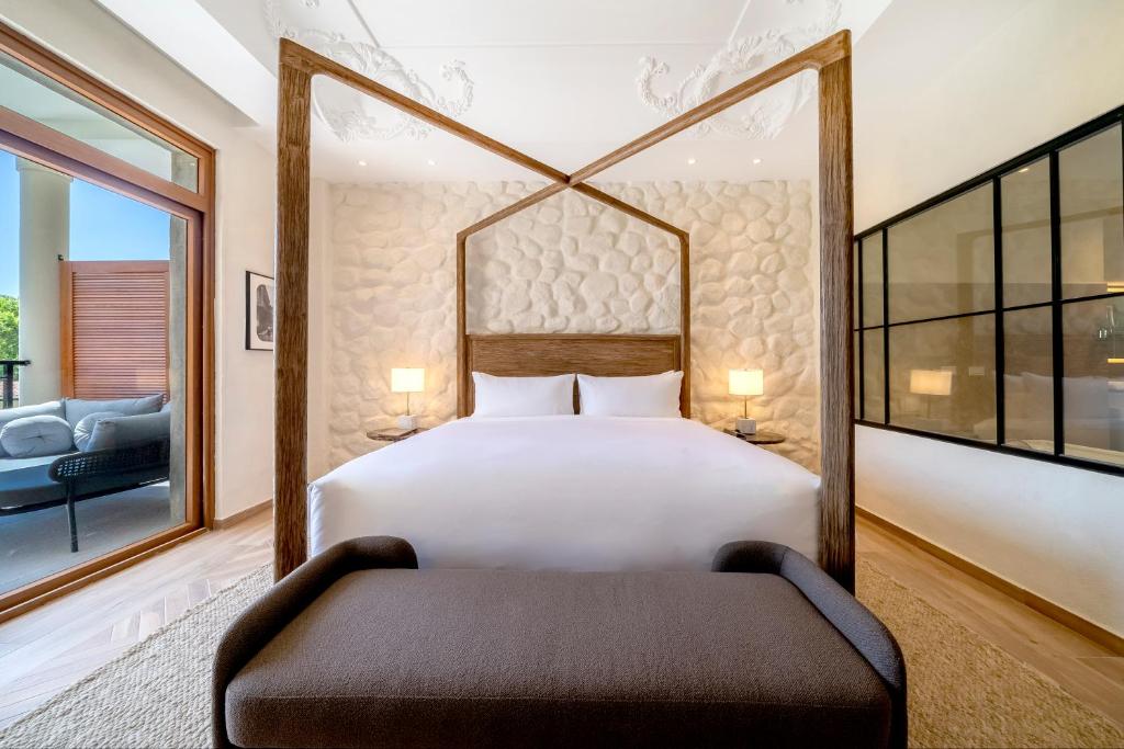 Postel nebo postele na pokoji v ubytování Hotel La Compania Del Valle