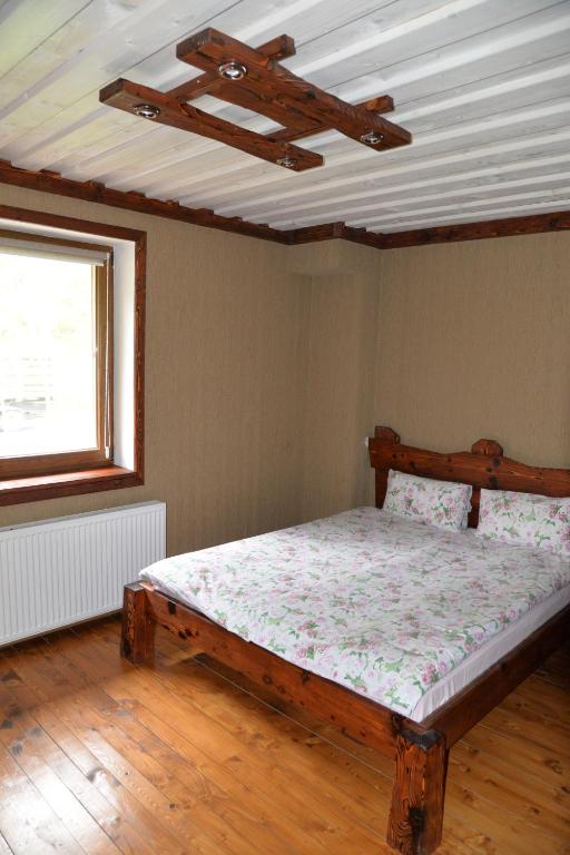 Postel nebo postele na pokoji v ubytování Syni Potoky