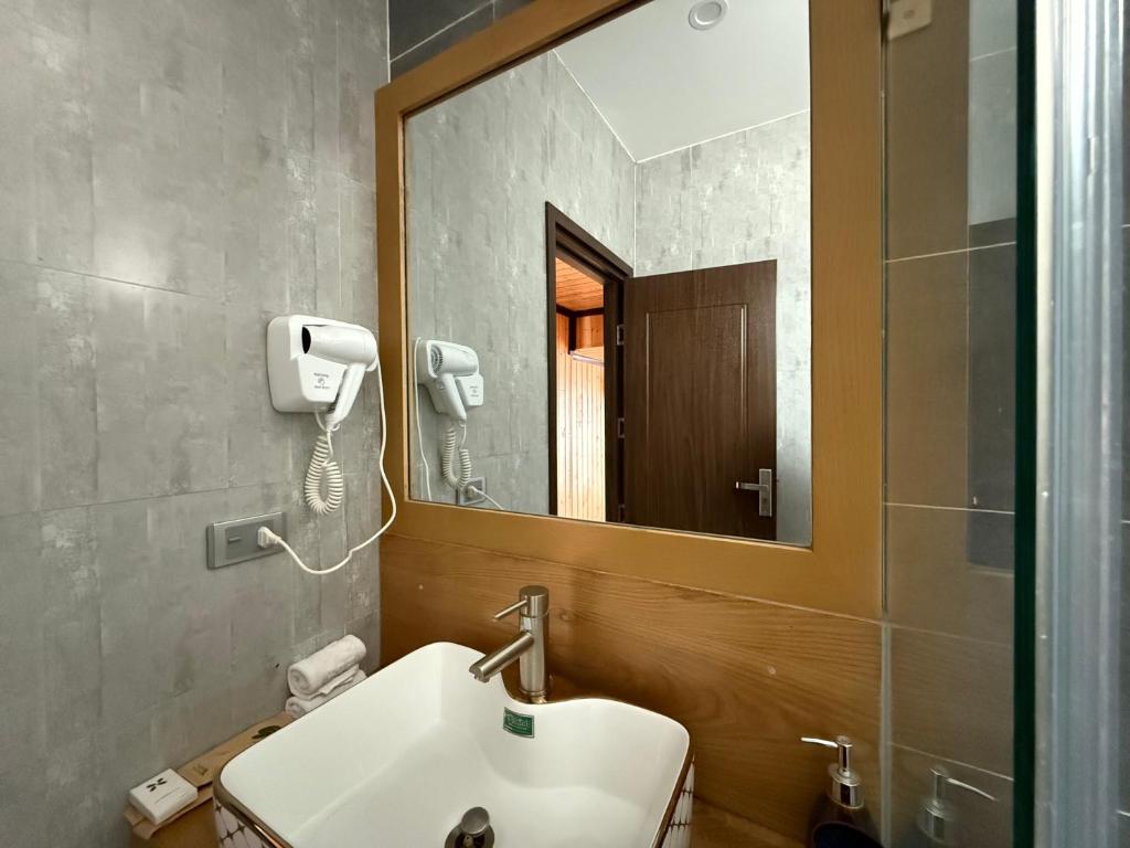 Koupelna v ubytování Cara dè NATURE Hotel and Spa By HAN