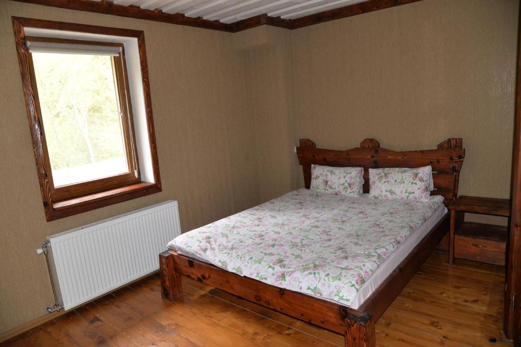 Postel nebo postele na pokoji v ubytování Syni Potoky