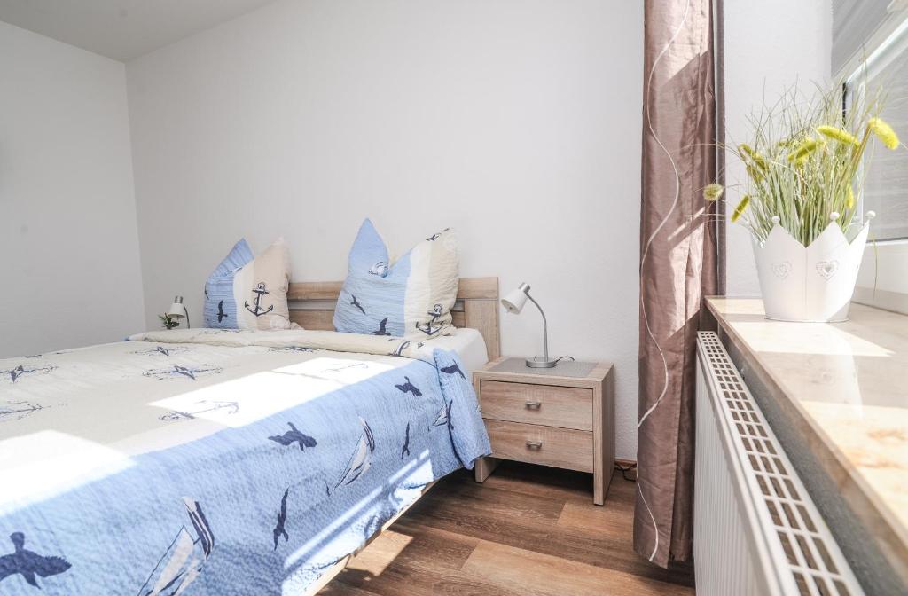 Postel nebo postele na pokoji v ubytování Seestern