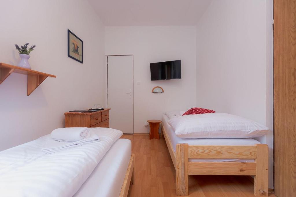 Postel nebo postele na pokoji v ubytování Korbáčikovo - Malá Fatra