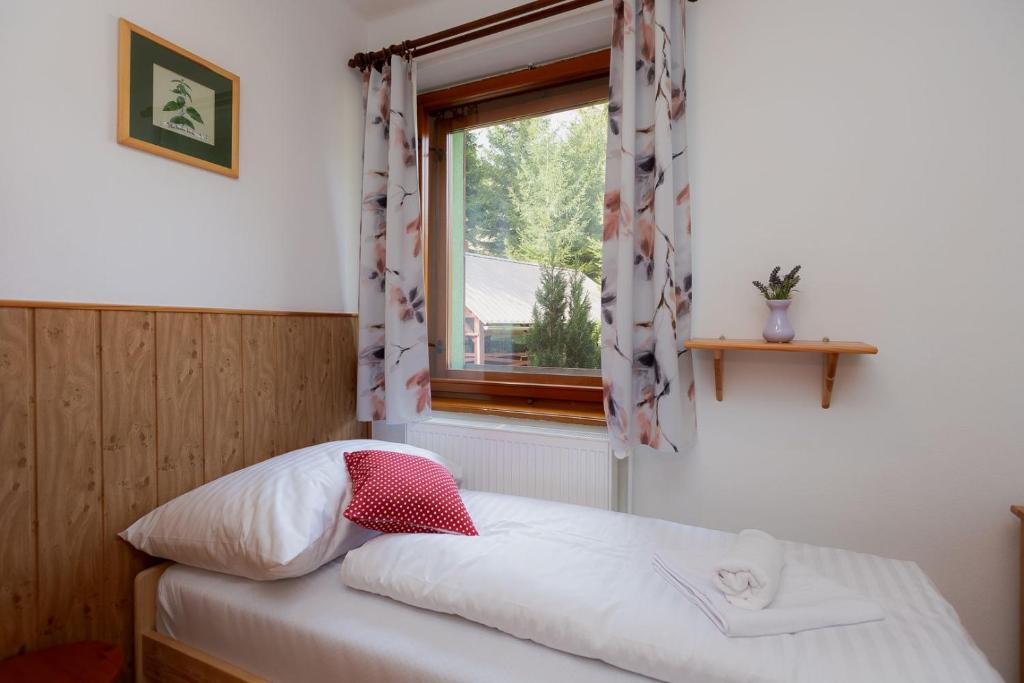 Postel nebo postele na pokoji v ubytování Korbáčikovo - Malá Fatra