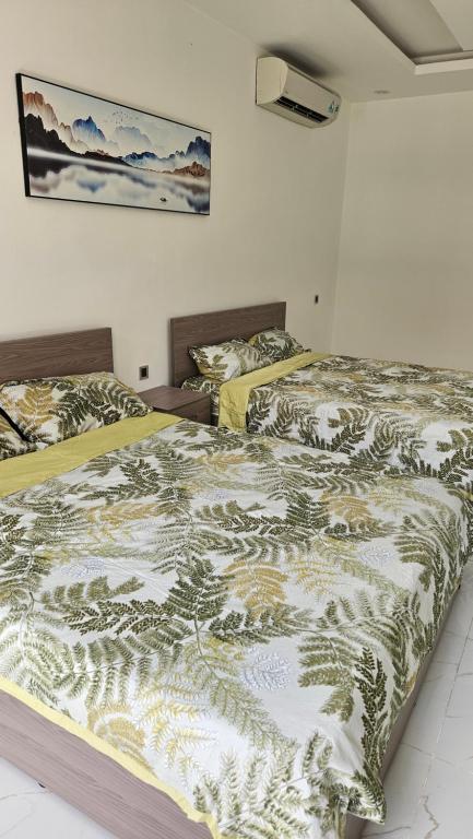 Кровать или кровати в номере ADRI Hotel