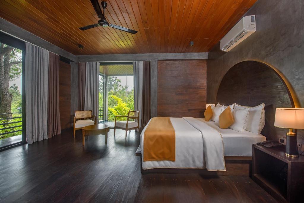 Letto o letti in una camera di Atha Resort