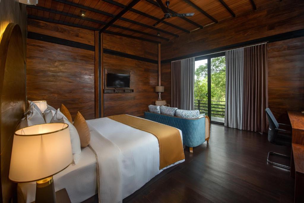 Letto o letti in una camera di Atha Resort