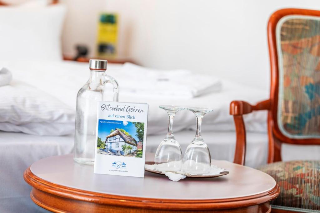 Postel nebo postele na pokoji v ubytování Hotel Stranddistel Rügen