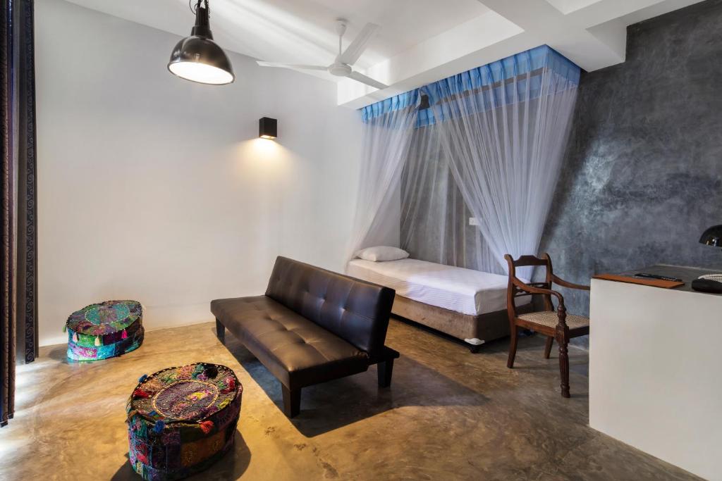 Postel nebo postele na pokoji v ubytování Culture Resort