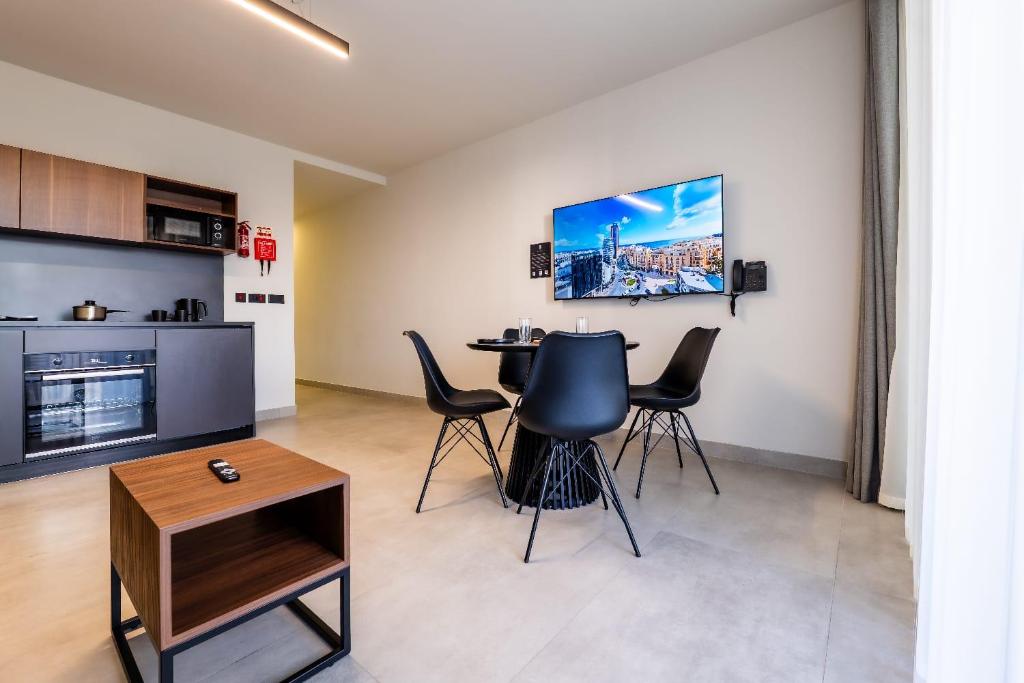 Kuchyň nebo kuchyňský kout v ubytování Onyx Hotel