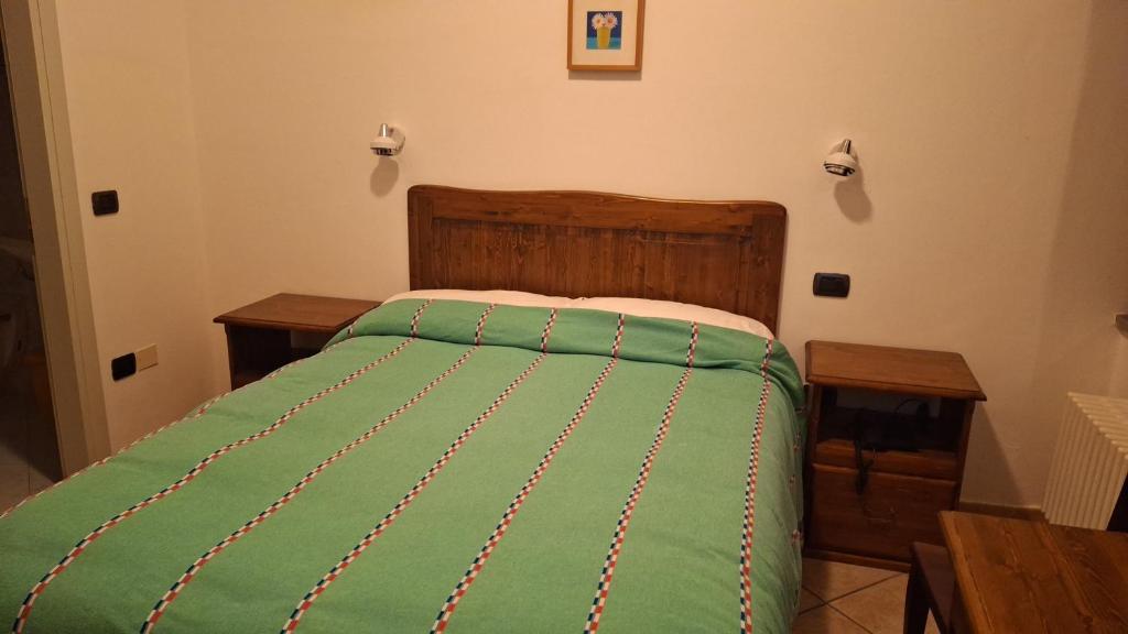 Łóżko lub łóżka w pokoju w obiekcie Acquacheta Valtancoli Hotel B&B