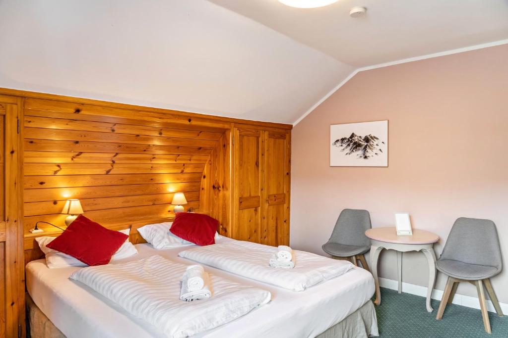 Postel nebo postele na pokoji v ubytování Chalet Sonneck - Seefeld