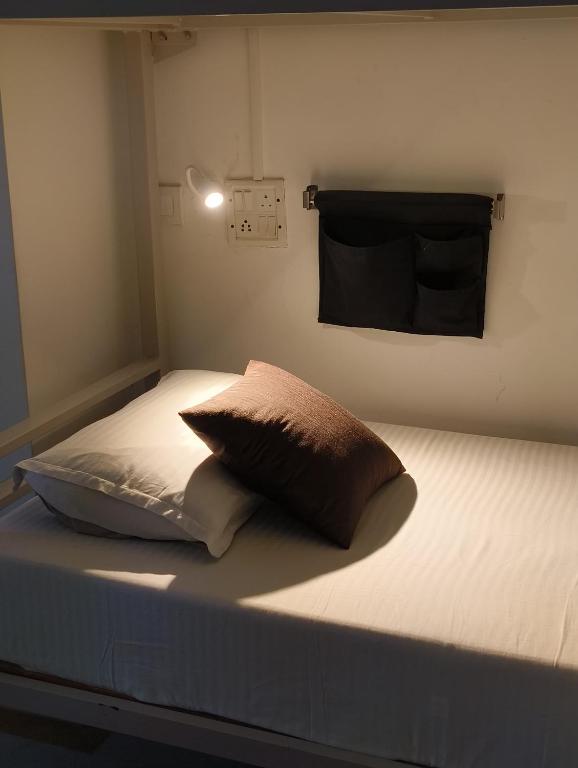 Postel nebo postele na pokoji v ubytování Bonjour Travellers Hostel