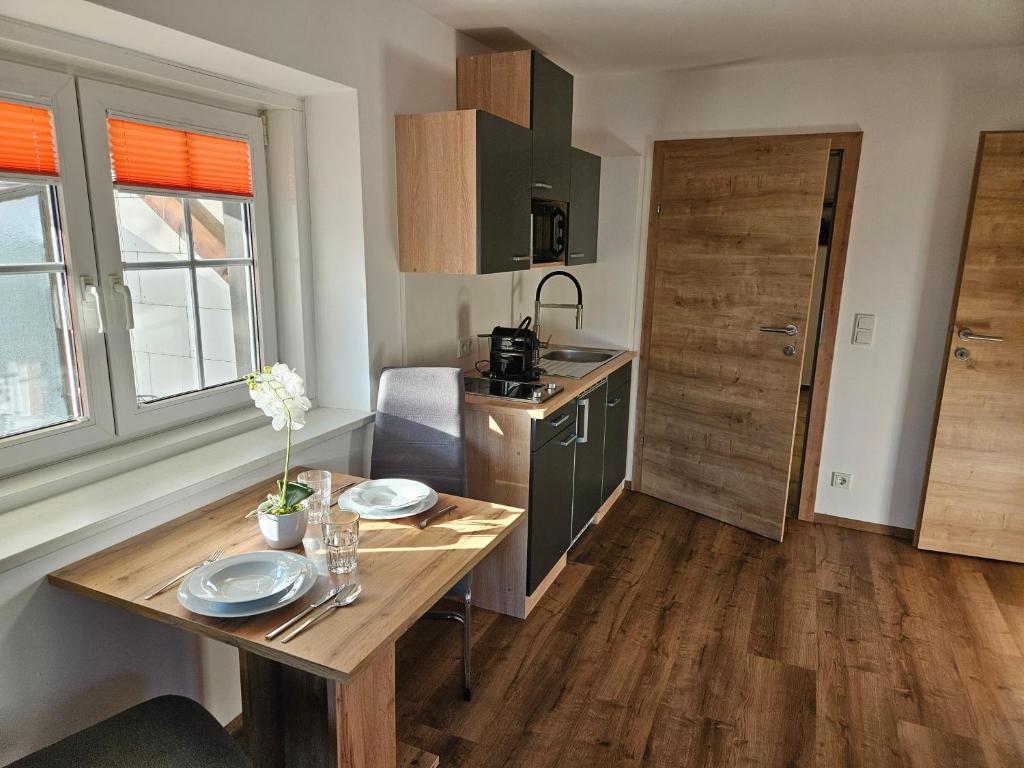 Kuchyň nebo kuchyňský kout v ubytování Günthers Apartments