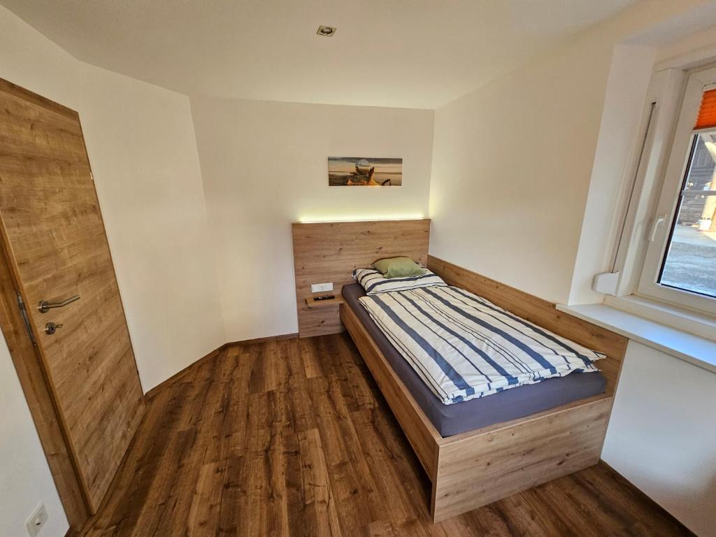 Postel nebo postele na pokoji v ubytování Günthers Apartments