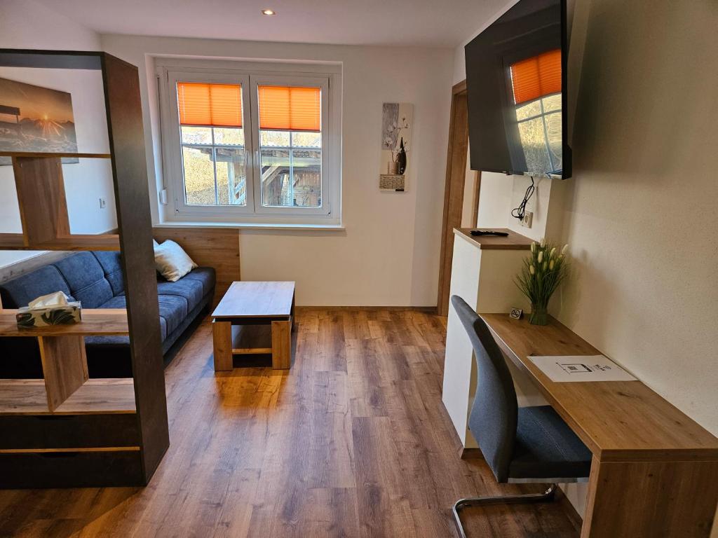 TV a/nebo společenská místnost v ubytování Günthers Apartments