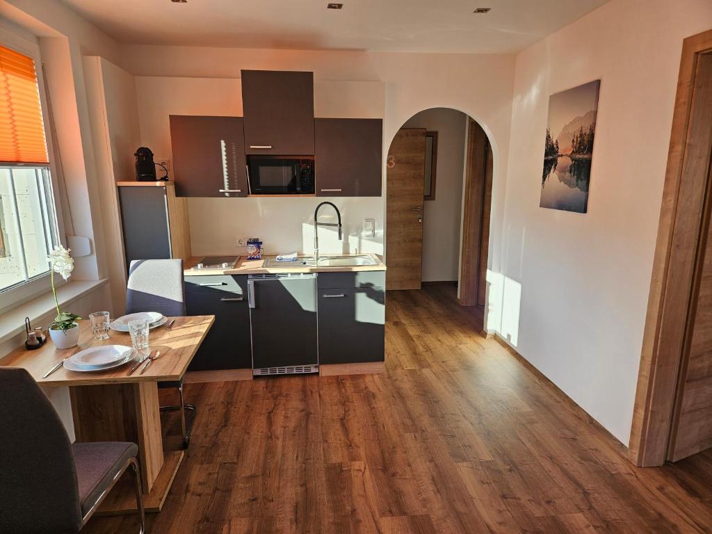 Kuchyň nebo kuchyňský kout v ubytování Günthers Apartments