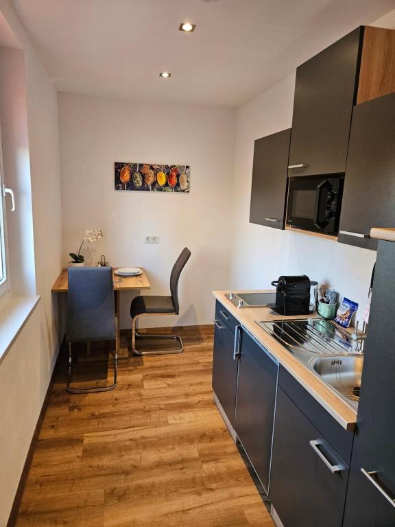 Kuchyň nebo kuchyňský kout v ubytování Günthers Apartments