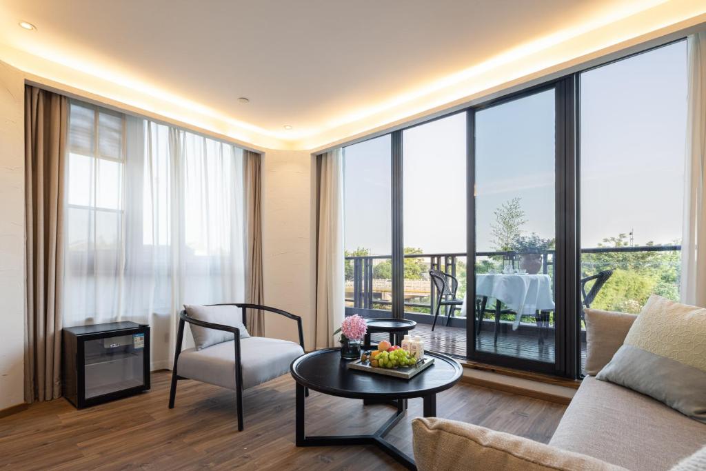 Posezení v ubytování Shanghai Zhujiajiao Xiangyu Independent Guesthouse