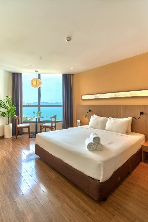 Postel nebo postele na pokoji v ubytování S Lux Apartment Starcity with Sea View