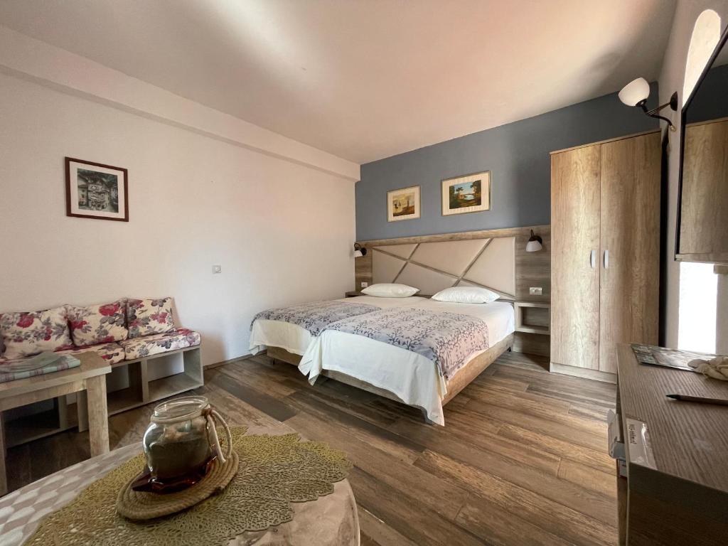 Postel nebo postele na pokoji v ubytování Guesthouse HHL - Liman ll