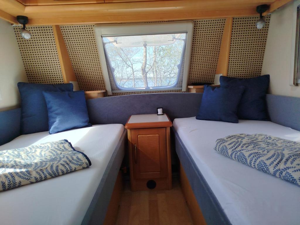 Postel nebo postele na pokoji v ubytování Auszeit am Chiemsee