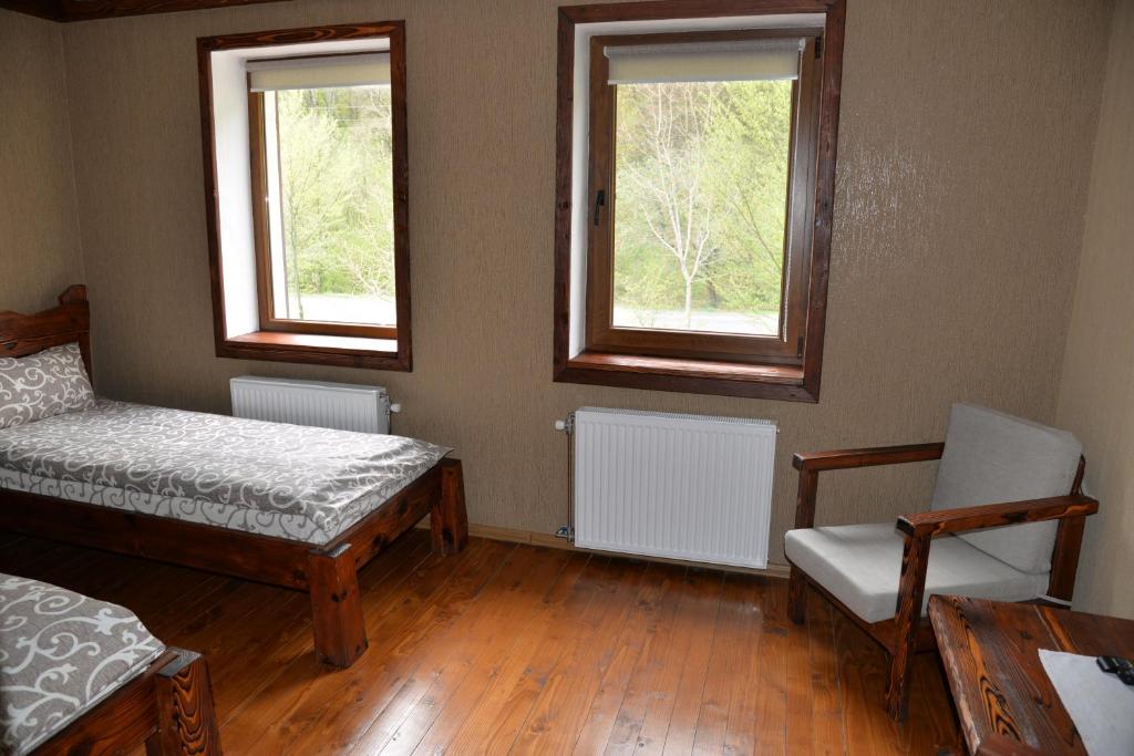 Postel nebo postele na pokoji v ubytování Syni Potoky