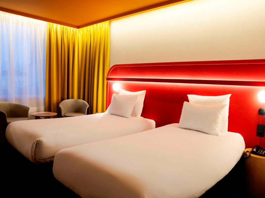 Posteľ alebo postele v izbe v ubytovaní Mercure Warszawa Centrum