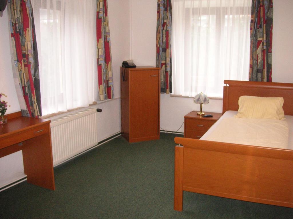 Posteľ alebo postele v izbe v ubytovaní HOTEL Jerolitsch