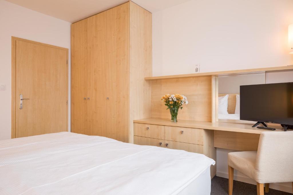 TV a/nebo společenská místnost v ubytování Hotel Vista