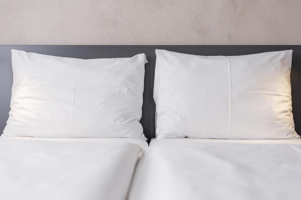 Postel nebo postele na pokoji v ubytování Hotel Vista