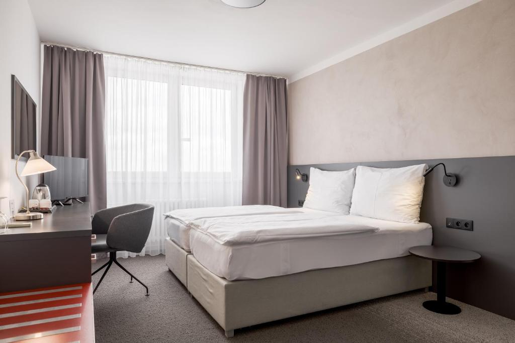 Postel nebo postele na pokoji v ubytování Hotel Vista