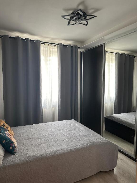 Posteľ alebo postele v izbe v ubytovaní Centrum Apartment Lipowa 12