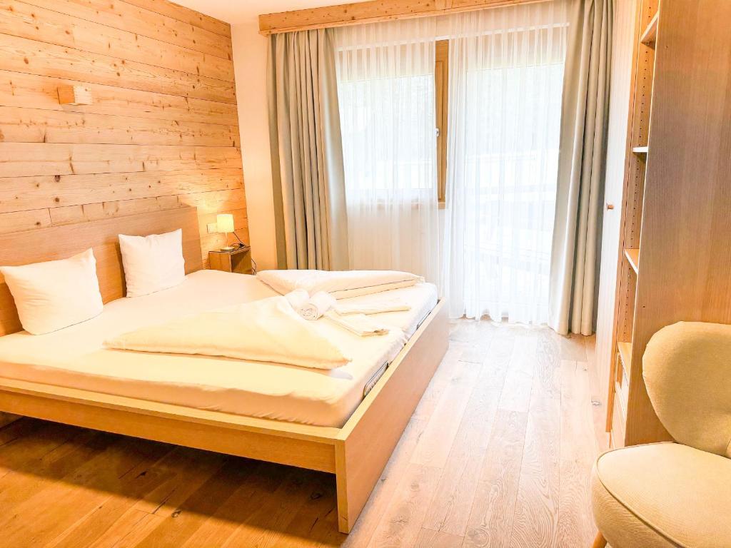 Posteľ alebo postele v izbe v ubytovaní Alpenchalet im Leutaschtal