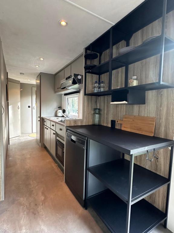 Kuchyň nebo kuchyňský kout v ubytování Chalet Tibi