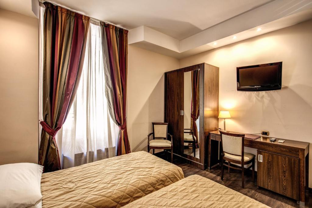Posteľ alebo postele v izbe v ubytovaní Hotel Villafranca