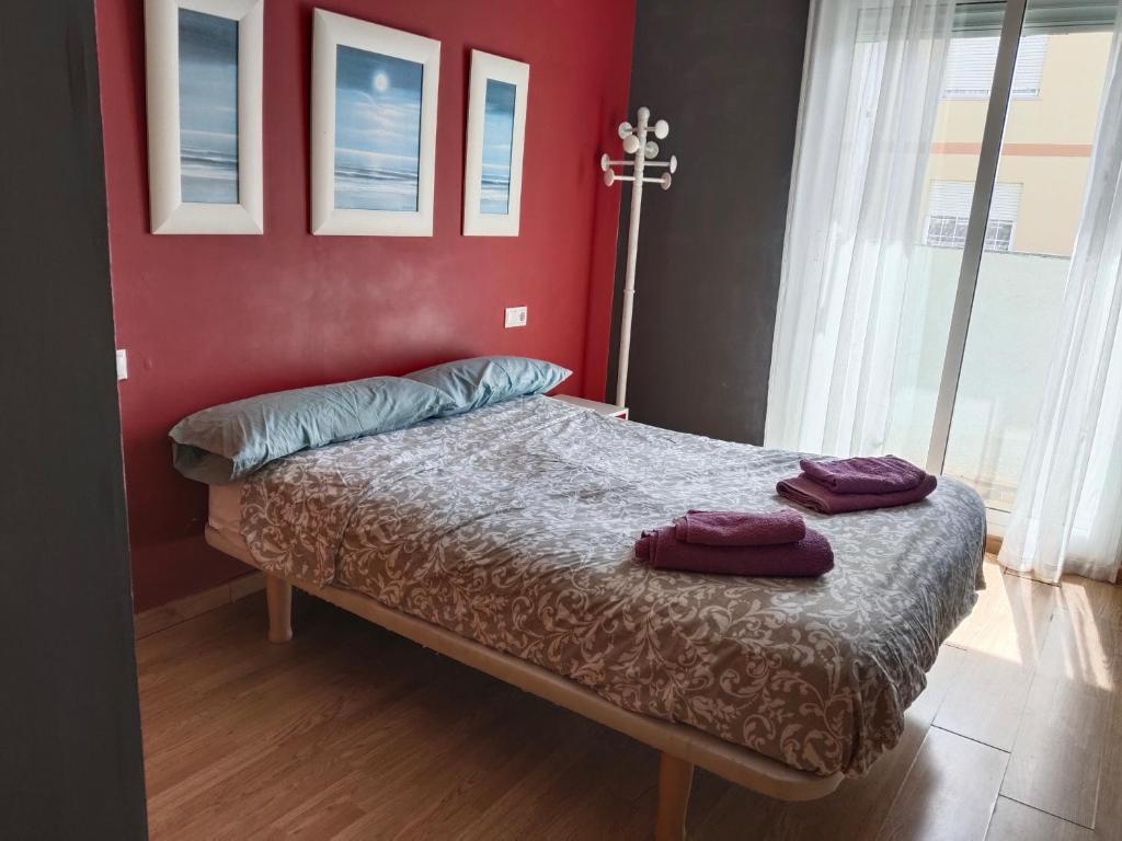 Postel nebo postele na pokoji v ubytování apartamento Daimuz playa